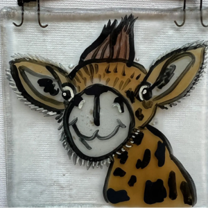 Cartoon giraffe on decorative glass panel