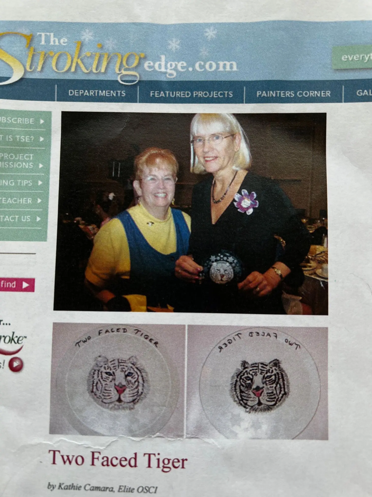 Smiling women holding painted plates