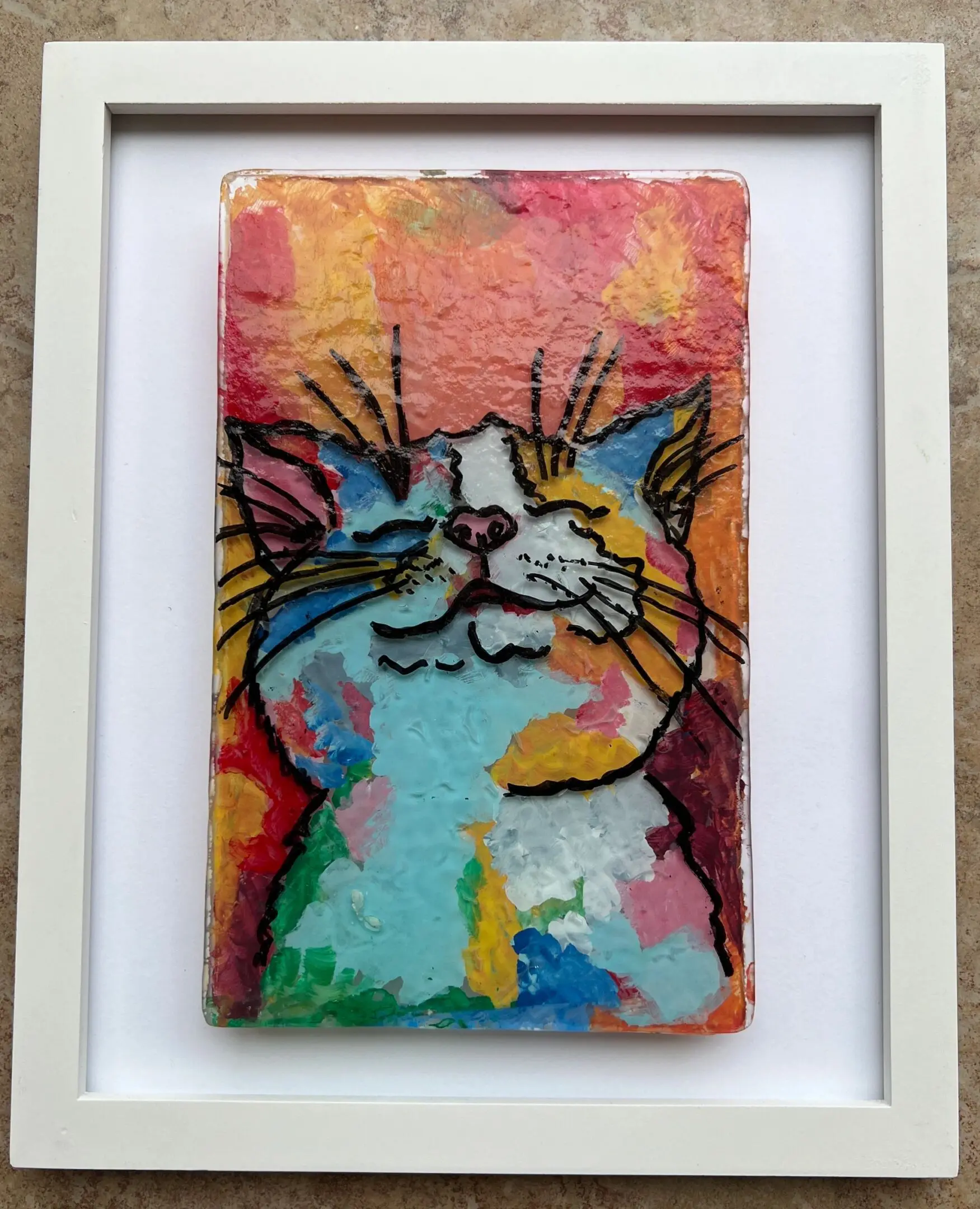 Whimsical cat artwork with colorful background