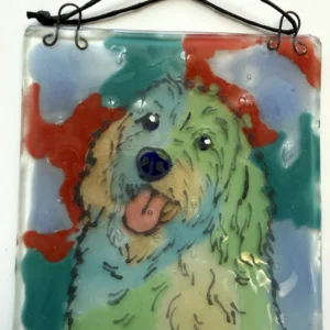 Colorful fused-glass dog wall hanging