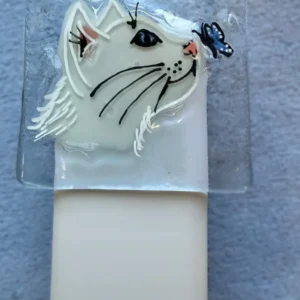 White cat face with butterfly on nose